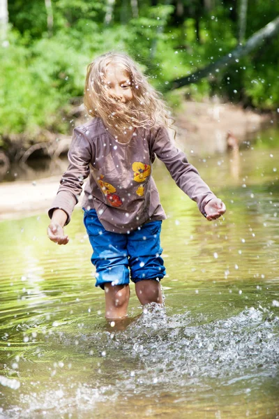 Adorable   girl  in   river on sunny   day — Stock Photo, Image