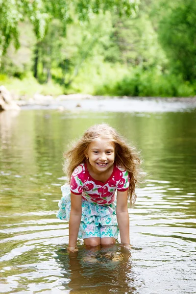 Adorable   girl  in   river on sunny   day — Stock Photo, Image