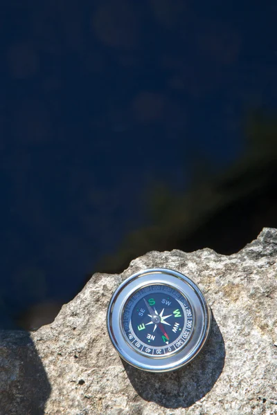 Analogic Compass Abandoned on the stone — Stock Photo, Image