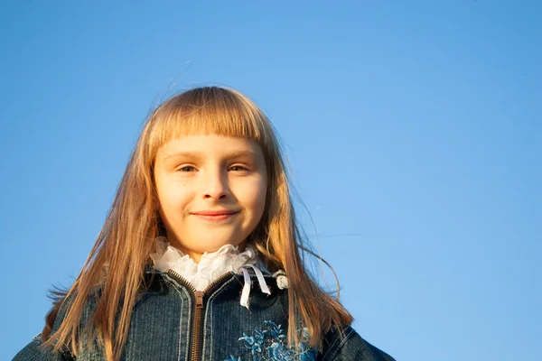 Young girl in the sunset light — Stock Photo, Image