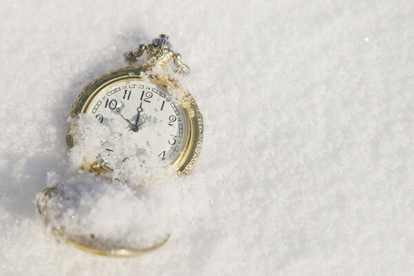 Watch lying in the snow before  new year