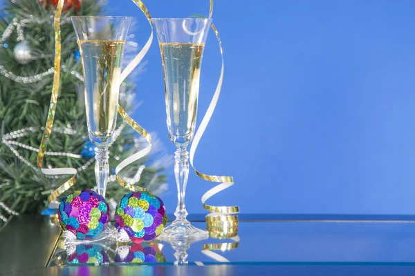 Two glass with champagne in blue style on table. — Stock Photo, Image