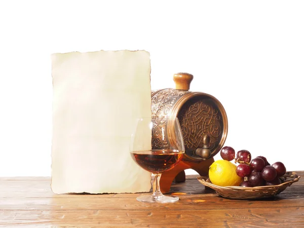 Glas konjak, fat, gamla papper isolerad på en vit bakgrund — Stockfoto