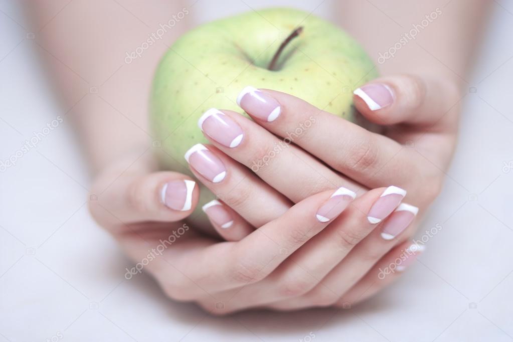 Apple in woman's hands
