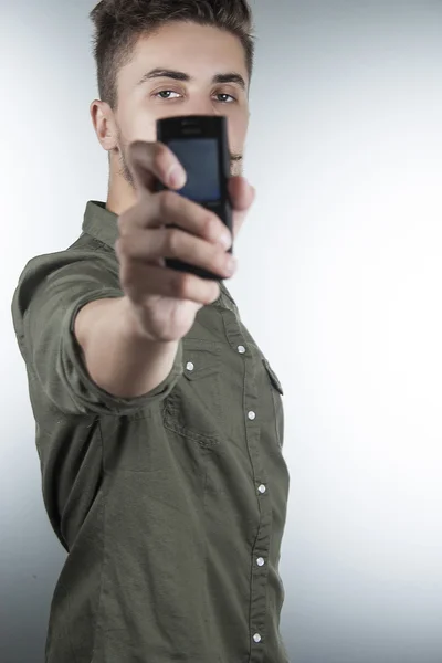 El joven con el teléfono — Foto de Stock