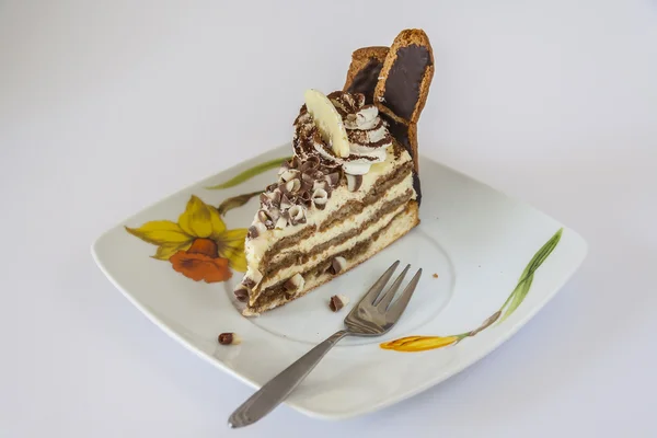 Torta e forchetta Tiramisù su un piattino — Foto Stock