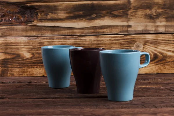 Tasse sur le fond en bois — Photo