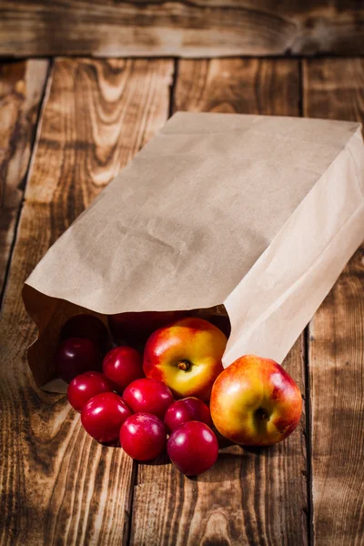 Fruits on the wooden background