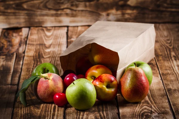 Fruits on the wooden background