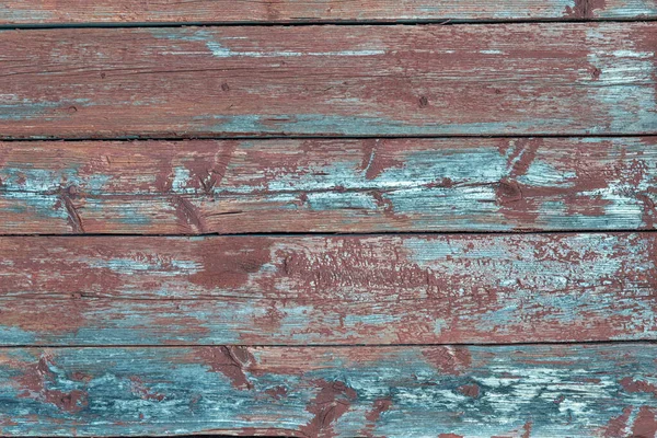 Horizontal rustic wood floor background pattern with cracks. Old grungy colorful wood background. Old weathered wooden plank.