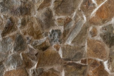 Taş bir duvarın dokusu. Arkaplan ya da doku olarak taş duvar