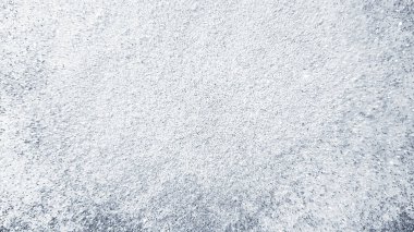 Parlak arkaplan ya da siyah beyaz duvar kağıdı ya da tek renkli ton. Kum duvardan yapılma.