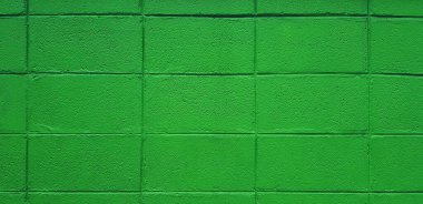 Yeşil tuğla ya da arka plan için klasik tonda blok duvar. Pastel ve duvar kağıdının renkli boyası. 