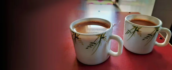 Indian tea or chai in ceramic cups isolated in clean background