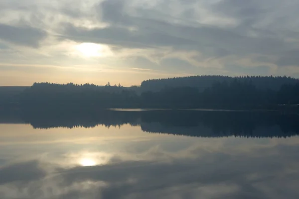 Winters Sun Cloudy Sky Reflected Perfectly Calm Water Redmires Reservoir — Stock Photo, Image