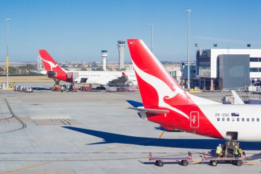 Melbourne, Avustralya - 20 Mart 2014: Avustralya Melbourne Havalanı Qantas uçak Park. Qantas Avustralya'nın ulusal havayolu şirketidir.
