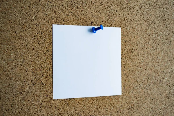 Close White Paper Note Cork Board Attached Blue Pushpin Copy — Stock Photo, Image