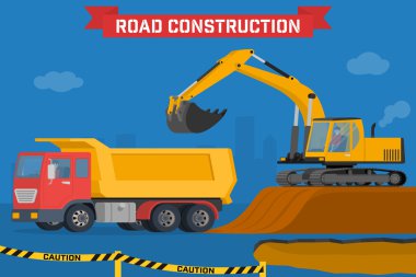 Ekskavatör kazma çukura zemin ve yük kamyonu.