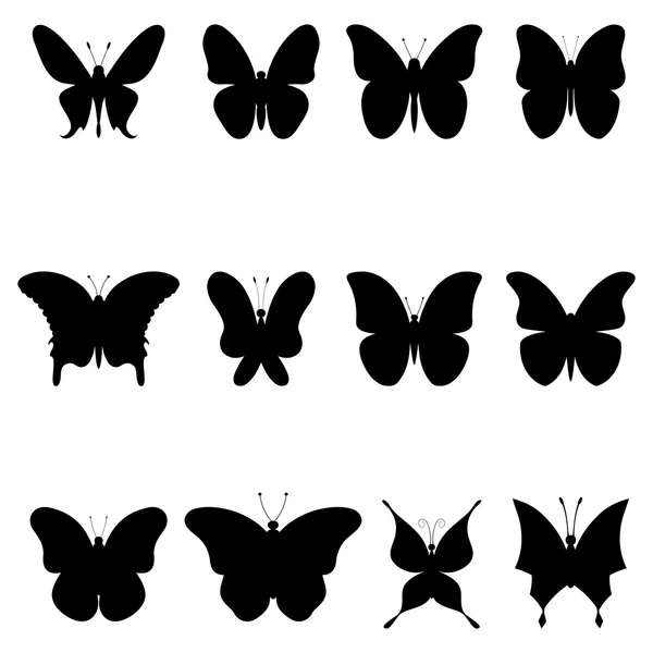 Fjärilar, svarta siluetter — Stock vektor