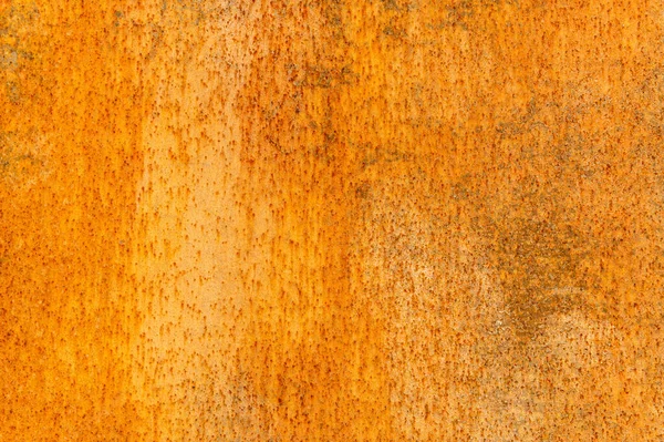 Grunge donker geel bruin gebarsten roestig vervormd ijzeren blad oud abstract doek Schildertextuur patroon — Stockfoto