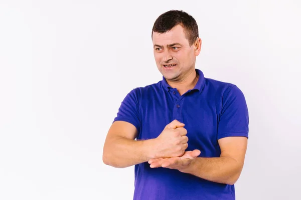 Emotional adult man with hearing impairment, looking side, shows sign gestures with his hands on a white background with space. — 图库照片