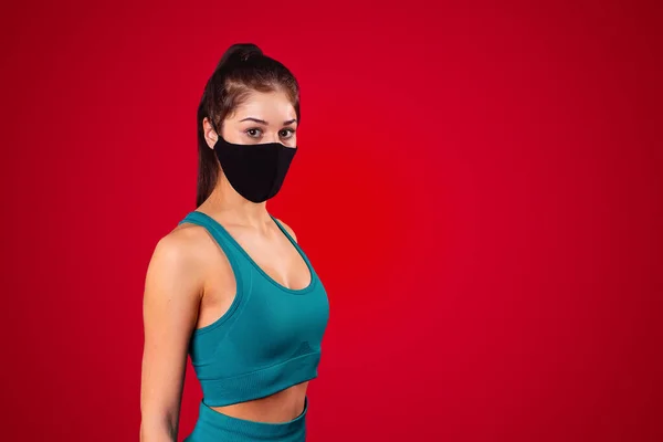 Sportive Young Woman Posing Black Multifunctional Mask Dressed Sports Uniform — Stock Photo, Image