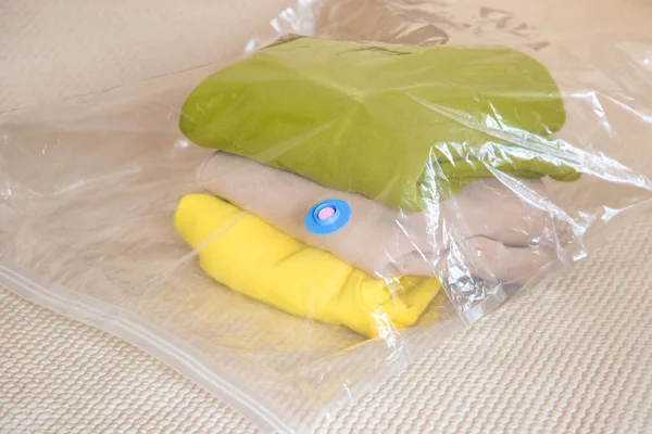 Plastic bag, vacuum for storage of clothes. Reusable.