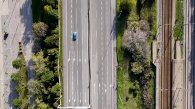 Aerial view of countryside around the Vasco da Gama bridge in Lisbon, with the view of highways and Tagus river. Top view of the longest bridge in Europe.
