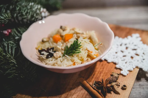 Thistle,dried fruit and rice on Christmas background — Stock Image Thistle,dried fruit and rice on Christmas background Royalty Free Stock Photos