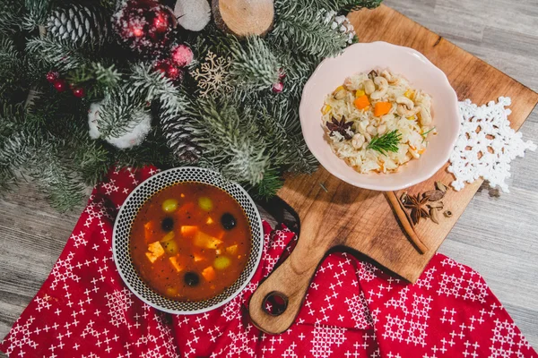 Thistle,dried fruit and rice on Christmas background — Stock Image Thistle,dried fruit and rice on Christmas background Stock Photo