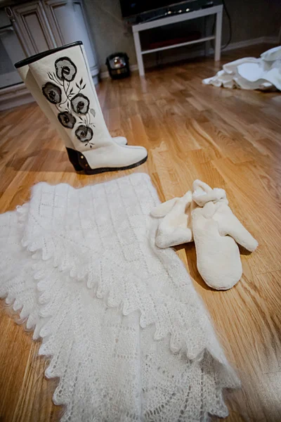 pair of woolen felt boots on white background