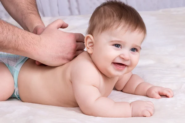 Baby doing massage — Stock Photo, Image