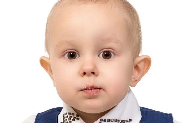 Niño con migajas en los labios — Foto de Stock