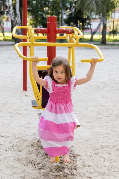 Little girl on the sports ground — Stock Photo, Image