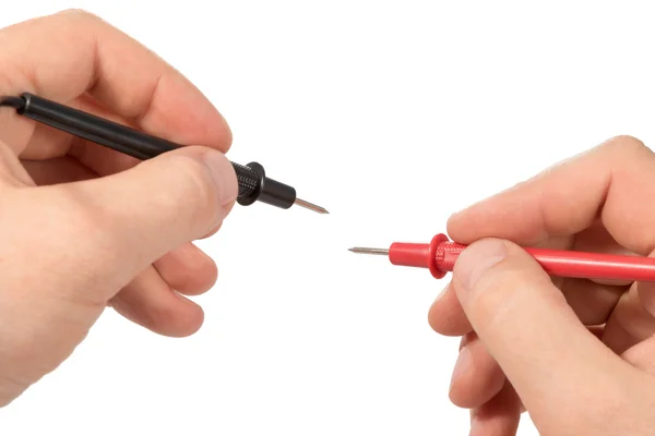 Elektrische tester op mannelijke handen — Stockfoto
