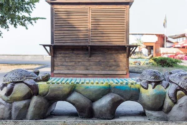 Decorative bench with turtles — Stock Photo, Image