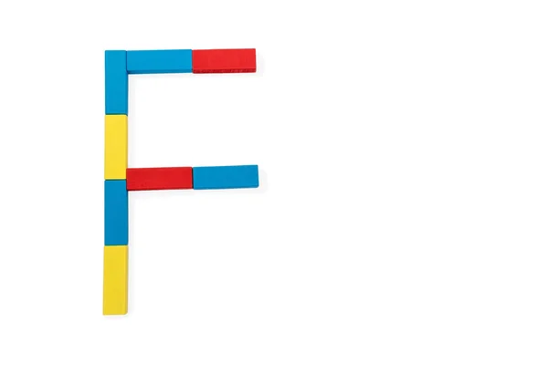 La lettre F est pliée en blocs de bois — Photo