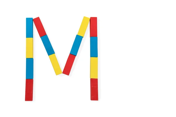Letter M is folded of wooden blocks — Stock Photo, Image