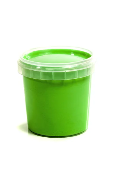 Jar with green gouache — Stock Photo, Image