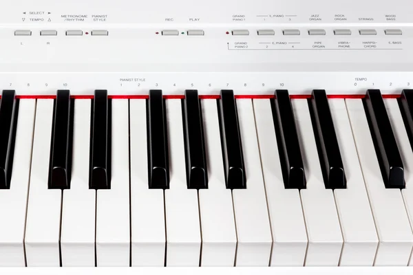 Keys of digital white piano synthesizer — Stock Photo, Image