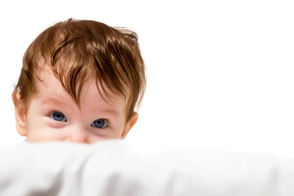 Little kid look out and smiling — Stock Photo, Image