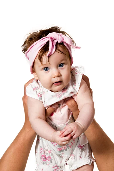 Mens hands hold the baby girl — Stock Photo, Image