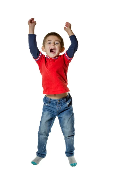 Little boy jumping isolated in white — Stock Photo, Image