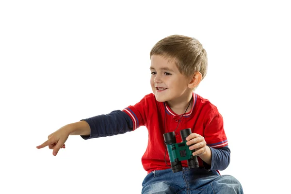 Happy boy pointing with his finger — Stock Photo, Image