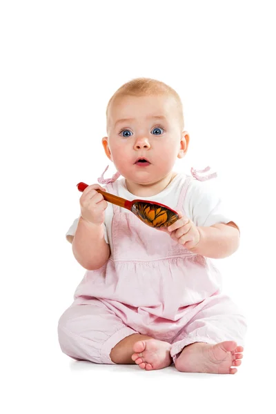 Baby mit Löffel in der Hand — Stockfoto