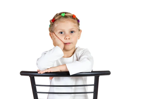 Niña sentada en silla —  Fotos de Stock