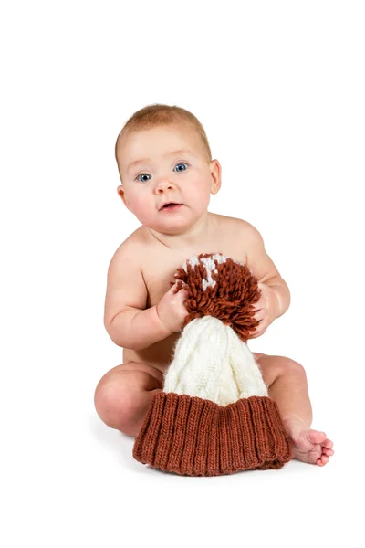 Toddler is holding a hat — Stock Photo, Image