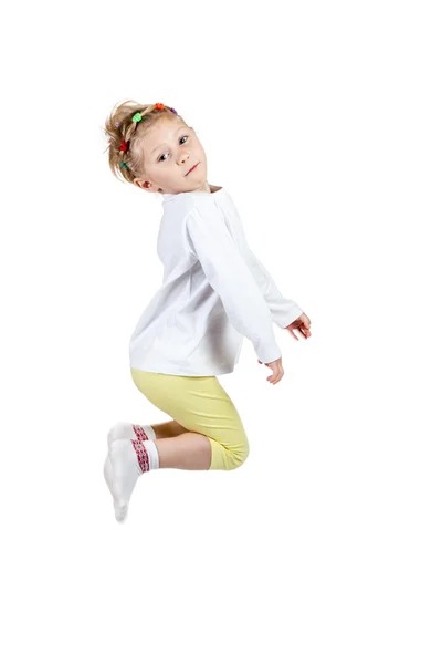 Little girl jumping high — Stock Photo, Image