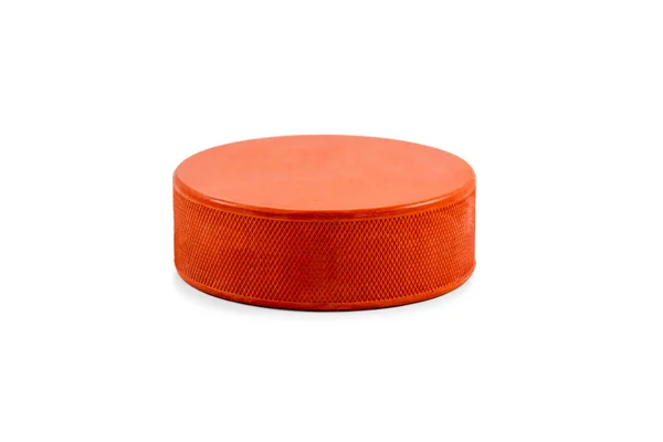 Oranžový hokejový puk — Stock fotografie