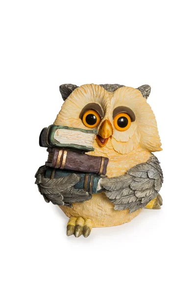 Figurine owl sitting with books — Stock Photo, Image